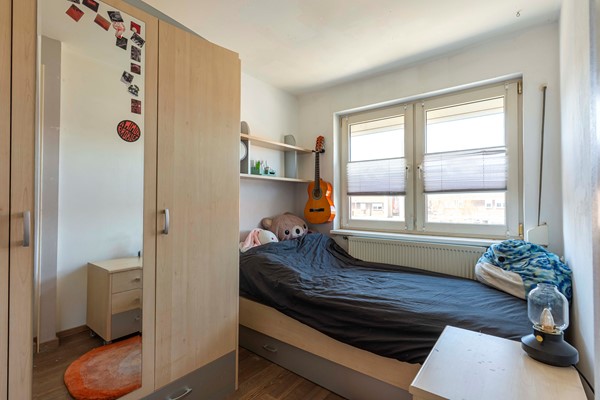 Foto - Te koop: Leuke, uitgebouwde tussenwoning uit 1927 met 3 slaapkamers en garage in de wijk Heksenberg